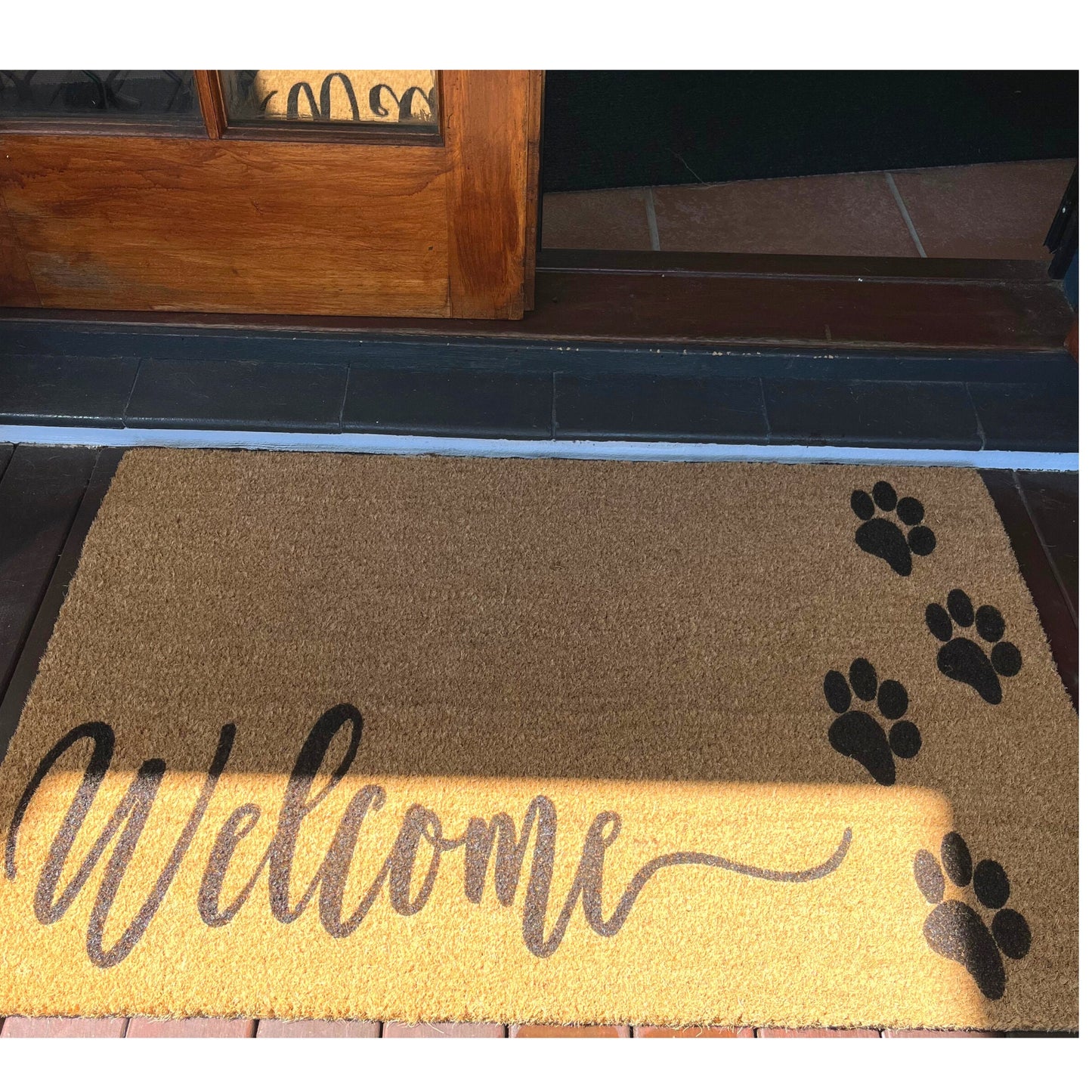 Doormat with paw prints