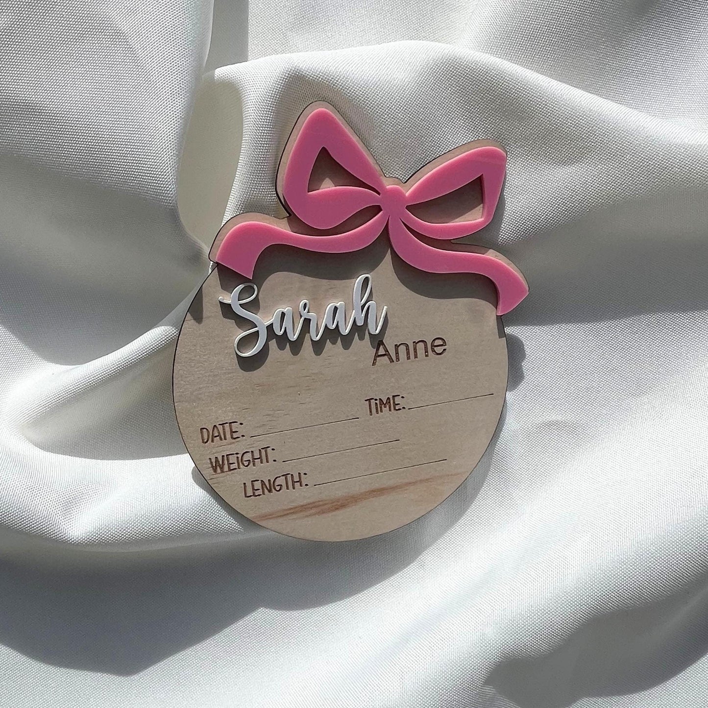Personalised baby announcement plaque with bow detail